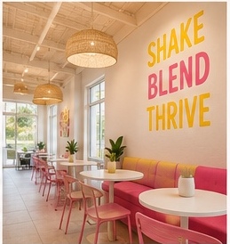 Dining area with yellow Shake Blend Thrive wall